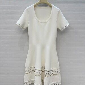 Alaia openwork floral short-sleeved knit dress